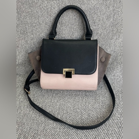 Elegant Black and Pink Satchel with Gold Accent - Picture 1 of 16
